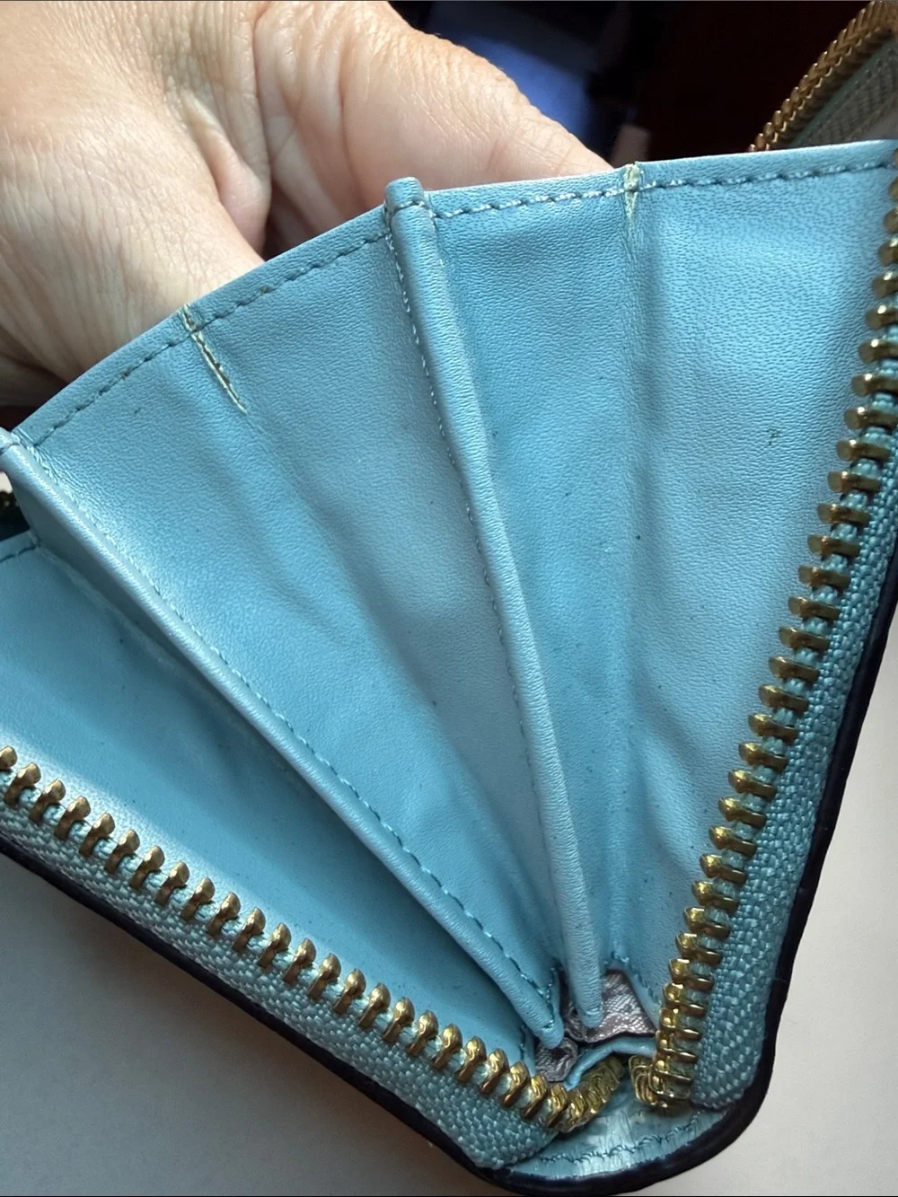 kate spade light blue pebbled gold tone zip-around wallet